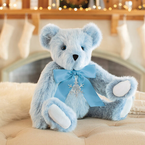 15" Winter Wonderland Bear - 15" seated jointed ice blue bear wearing a blue satin bow with a Danforth Pewter snowflake ornament image number 0