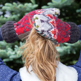 Bernie Mittens - Model wearing Adult One Size Assorted multi colored wool blend mittens with fleece lining image number 5