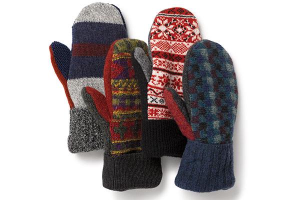 An image of 4 unique pairs of Vermont Mitten Company mittens in various colors and patterns