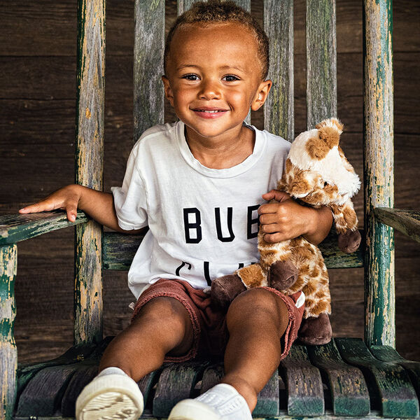 15" Buddy Giraffe - brown and tan print giraffe with boy in outdoor scene