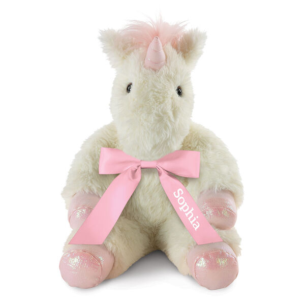 18" Fluffy Fantasies Unicorn - Front view of seated creamy white Unicorn with iridescent pink horn and hooves and fluffy mane wearing pink satin bow  image number 3
