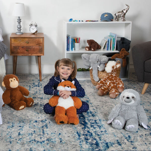 18" Oh So Soft Sloth - 18" Elephant, 18" Giraffe, 18" Sloth, 18" Monkey, and 18" Fox sitting on the floor in a bedroom with a child in pajamas image number 7