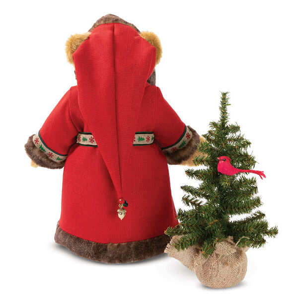 15" Limited Edition Woodland Santa Bear - Back view of standing jointed bear with green eyes dressed in red velvet hooded coat with trim, brown pants, green shirt, white beard and glasses. Holding a Christmas tree with cardinal in branches - Honey brown fur
