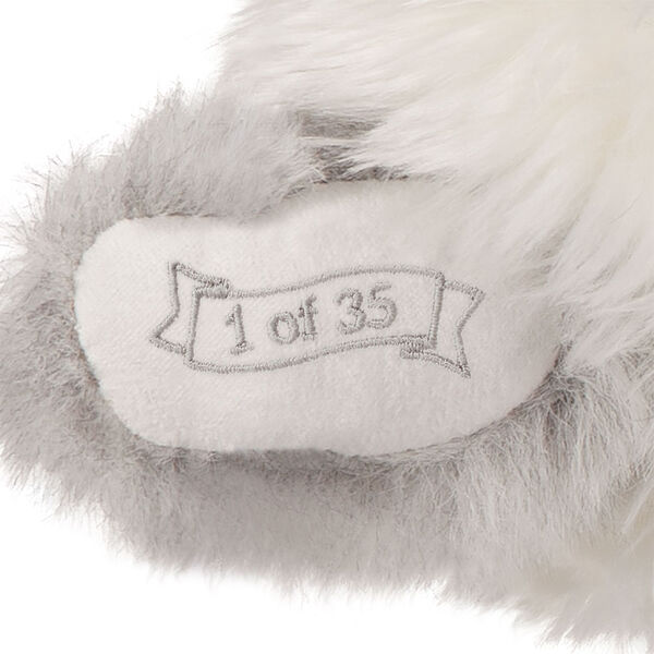 15" Limited Edition Snowflake Santa - close up of bear's right paw with "1 of 35" embroidery