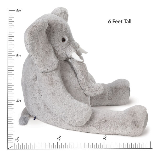 6' Giant Cuddle Elephant - Side view of seated grey plush elephant with measurement of 6 feet tall image number 4