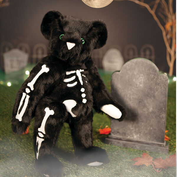 15" Skeleton Bear -  Standing front view of jointed black bear with glow in the dark eyes and bones white nose and white pads.  image number 1