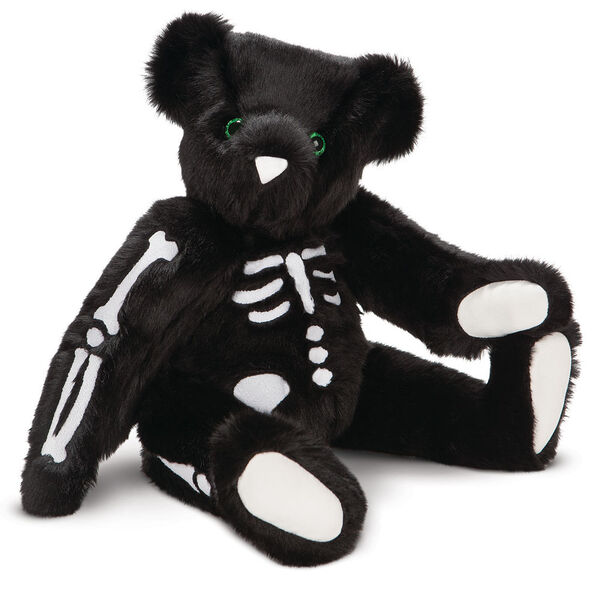 15" Skeleton Bear -  Seated 3/4 view of jointed black bear with glow in the dark eyes and bones white nose and white pads.  image number 0