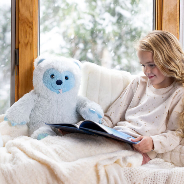 18" Fluffy Fantasy Yeti - Front view of white seated stuffed animal Yeti in a bedroom scene with child image number 5