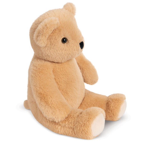13" Bear Snuggle Pal - Three quarter view of seated light brown bear weighted stuffed animal with ivory foot pads image number 3
