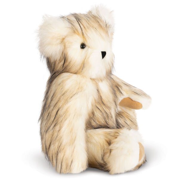 20" Special Edition Toasted Marshmallow Bear - Seated side view of jointed white with brown tipped fur bear and tan foot pads in outdoor scene  image number 2