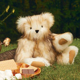 20" Special Edition Toasted Marshmallow Bear - Seated jointed white with brown tipped fur bear and tan foot pads in outdoor scene  image number 3
