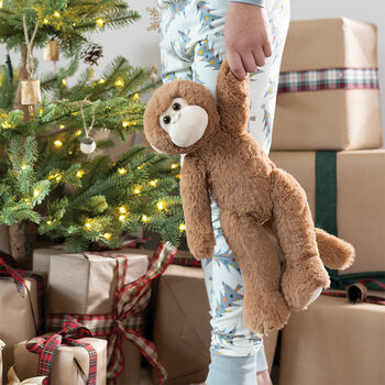15" Buddy Monkey - Front view of Monkey weighted stuffed animal held by child