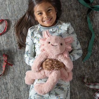 15" Buddy Axolotl - Front view of pink Axolotl weighted stuffed animal being held as a Christmas gift