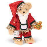 15" Limited Edition Christmas Cookie Santa Bear - Standing jointed buttercream bear with blue eyes wearing satin pajamas, a matching nightcap, a white beard, and glasses and holding a cookies and list. image number 1