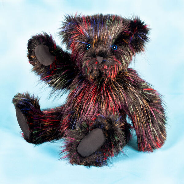 20" Special Edition Fireworks Bear - Front seated 3/4 view of 20" jointed black licorice bear with filaments of colored fur throughout. Bear has blue eyes and grey paw pads. image number 1