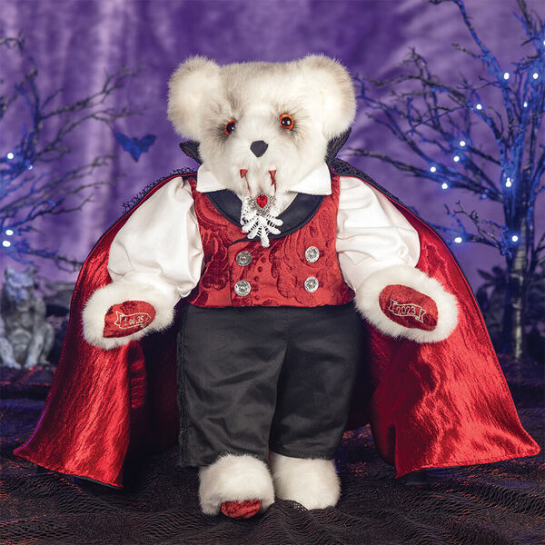 15" Limited Edition Count Dracula Vampire Bear - Standing jointed vanilla bear with fangs and orange eyes dressed in a highly detailed cape, vest, pants and shirt in a Halloween decorative scene image number 1