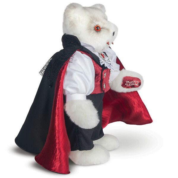 15" Limited Edition Count Dracula Vampire Bear - Side view of standing jointed vanilla bear with fangs and orange eyes dressed in a highly detailed cape, vest, pants and shirt.