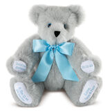 15" Premium Baby Boy Bear - Front view of seated jointed gray bear with white paw pads and chose of eye color wearing a blue satin bow. All 4 paw pads are personalized with baby's name, birth date, pounds and inches at birth.  image number 0