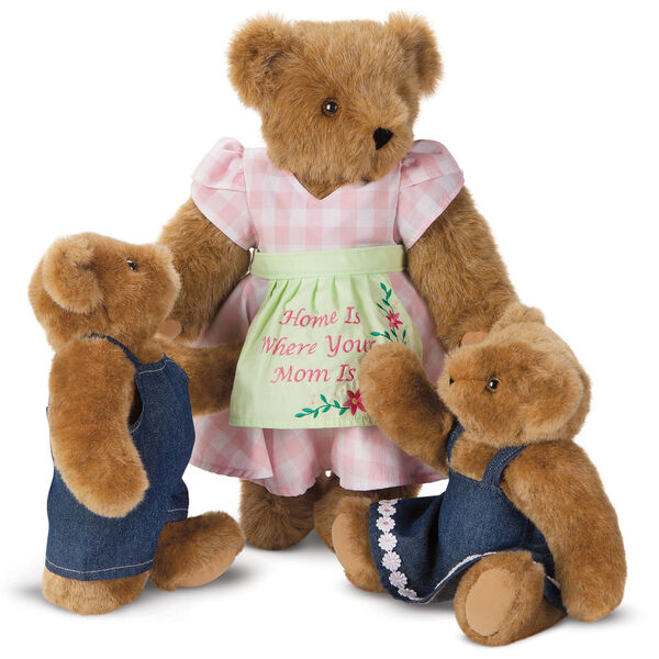 15" Home Is Where Your Mom Is Bear - Front view of standing jointed bear wearing a pink gingham dress, green bow and apron with floral embroidery and says "Home is Where Your Mom Is". Two honey cubs dressed in denim overalls and dress - Honey brown fur image number 4