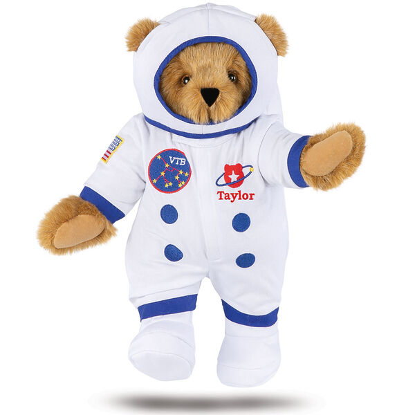 15" Astronaut Bear - Standing jointed bear dressed in white space suit, boots and helmet with blue trim and embroidered patches. Suit is personalized with "Taylor" in red lettering on the left chest below the planet artwork - Honey brown fur image number 0