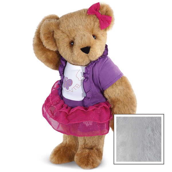 15" Glitter Whimsy Bear - Three quarter view of standing jointed bear dressed in a pink skirt and hair bow, white shirt with butterfly graphic, purple shorts and sweater - Gray image number 4