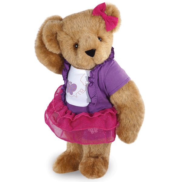 15" Glitter Whimsy Bear - Three quarter view of standing jointed bear dressed in a pink skirt and hair bow, white shirt with butterfly graphic, purple shorts and sweater - Honey brown fur image number 0