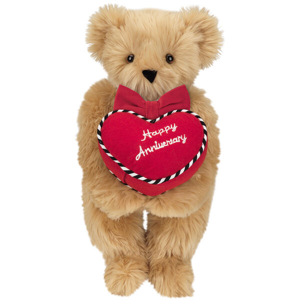 15" Happy Anniversary Bear - Front view of standing jointed bear dressed in a red velvet bow tie and holding a red heart pillow that says' Happy Anniversary" in white  - Maple brown fur image number 6