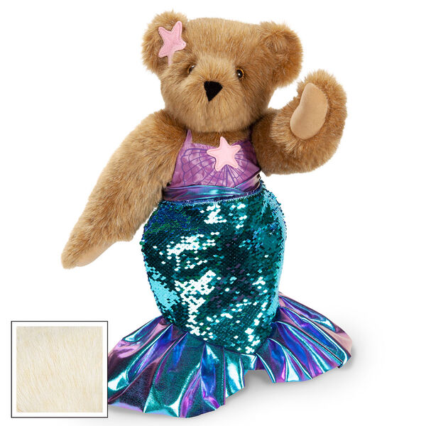 15" Mermaid Bear - Three quarter view of standing jointed bear dressed in a blue sequin tail and purple top with shell embroidery an pink starfish applique and earpiece - buttercream brown fur image number 4
