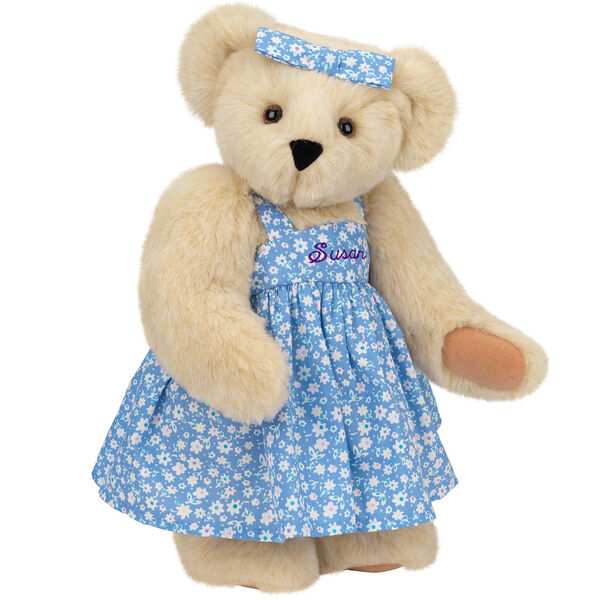 15" Mother Bear - Three quarter view of standing jointed bear dressed in blue floral dress and hair bow personalized with "Susan" in purple on bodice of dress - Buttercream brown fur image number 2