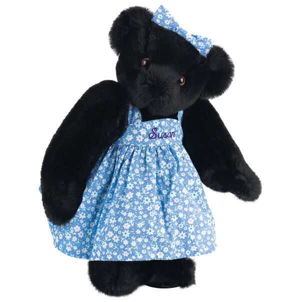 15" Mother Bear - Three quarter view of standing jointed bear dressed in blue floral dress and hair bow personalized with "Susan" in purple on bodice of dress - Black fur