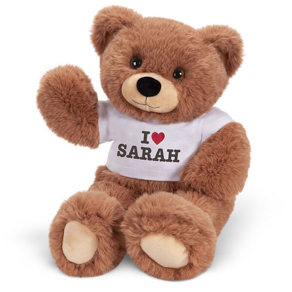 18" Oh So Soft Teddy I Heart You T-Shirt Bear - Front view of waving seated brown bear in white t-shirt with "I Heart (your name)" image number 1