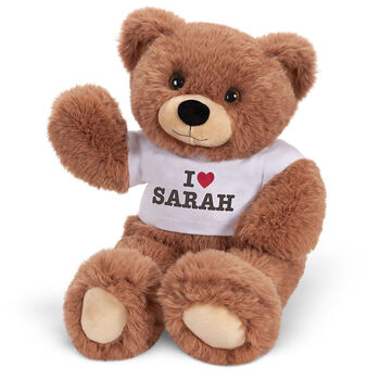 18" Oh So Soft Teddy I Heart You T-Shirt Bear - Front view of waving seated brown bear in white t-shirt with "I Heart (your name)"