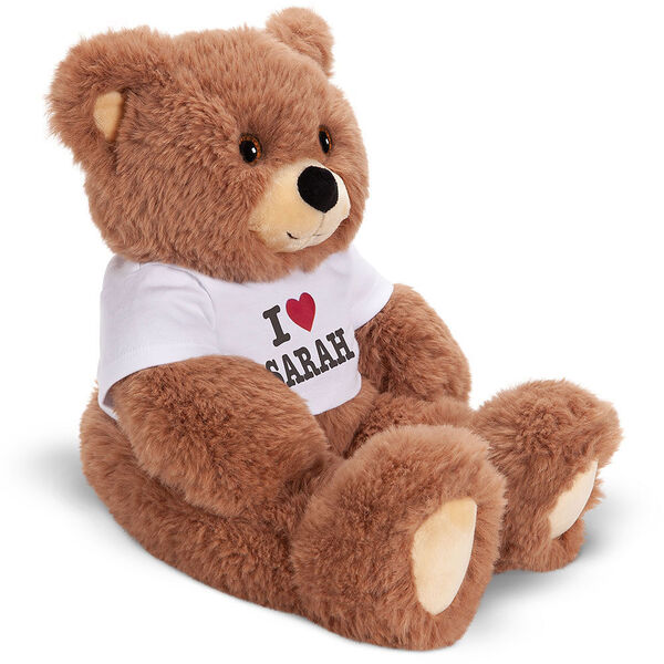 18" Oh So Soft Teddy I Heart You T-Shirt Bear - Side view of seated brown bear in white t-shirt with "I Heart (your name)" image number 2