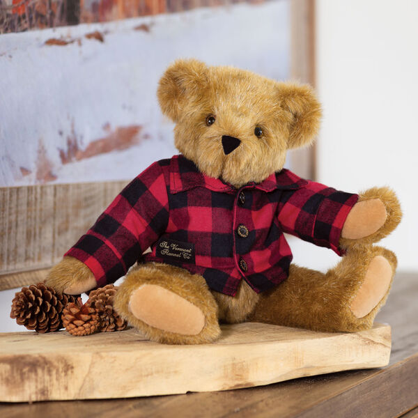 15" Vermont Flannel Bear, Buffalo Plaid - Front view of 15" seated bear with button down Vermont Flannel shirt in a decorative setting